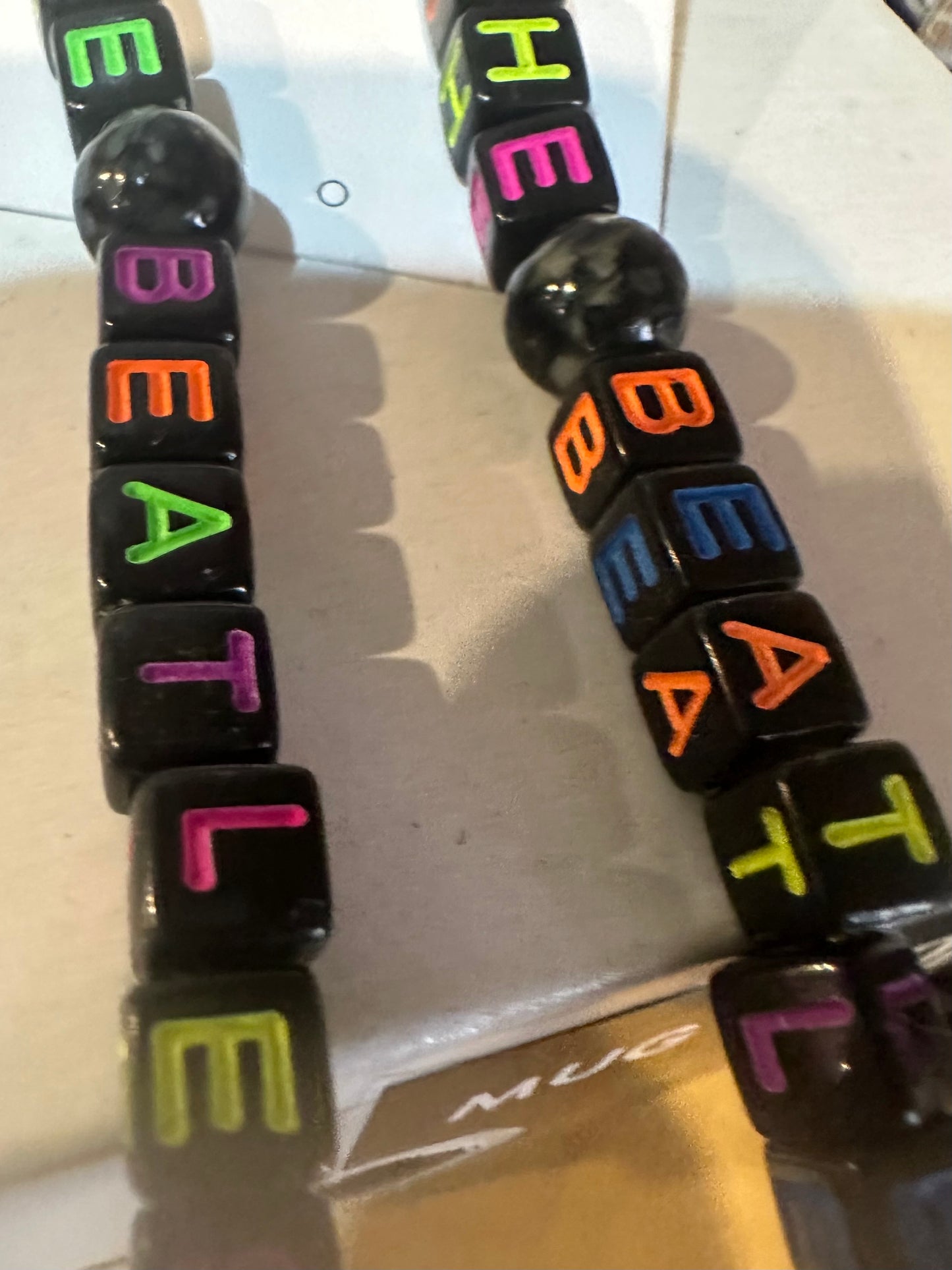 Unique Dangling Beatle Earrings