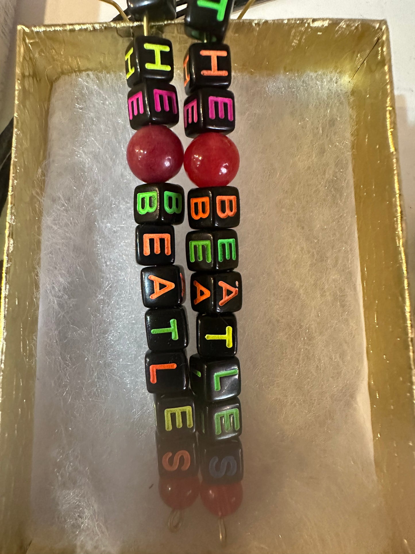 Unique Dangling Beatle Earrings