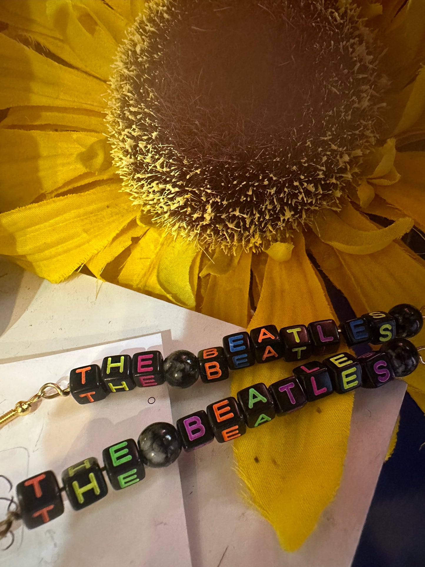Unique Dangling Beatle Earrings