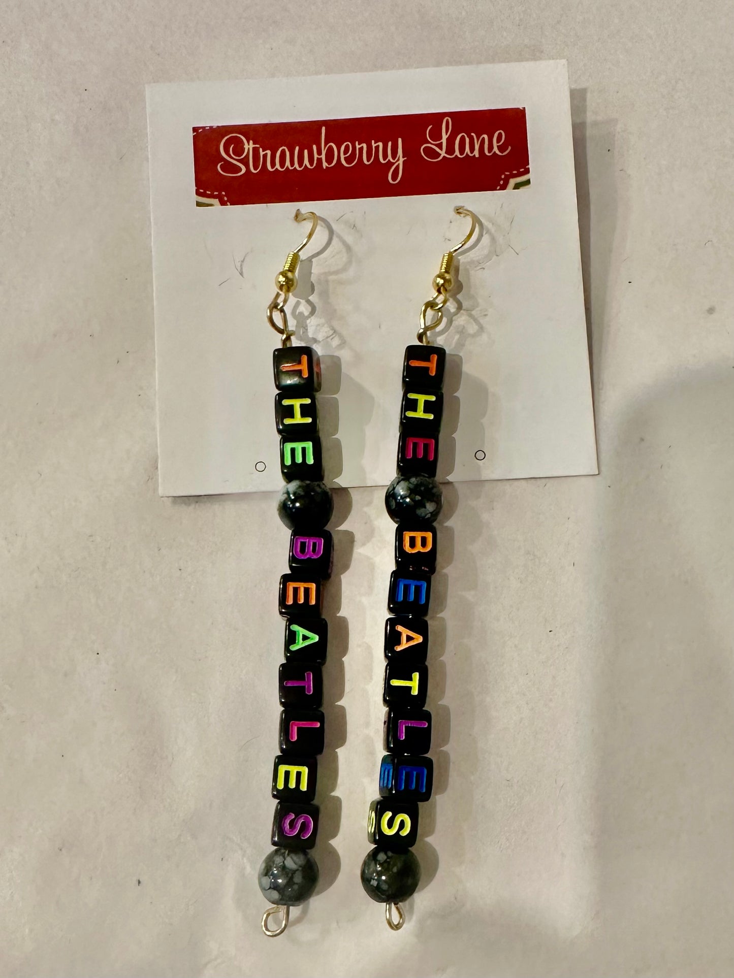 Unique Dangling Beatle Earrings